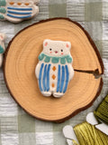 Handmade Ceramic Needle Minder – White Circuses Bear