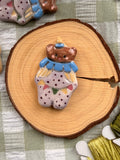 Handmade Ceramic Needle Minder – Dark Brown Circuses Bear