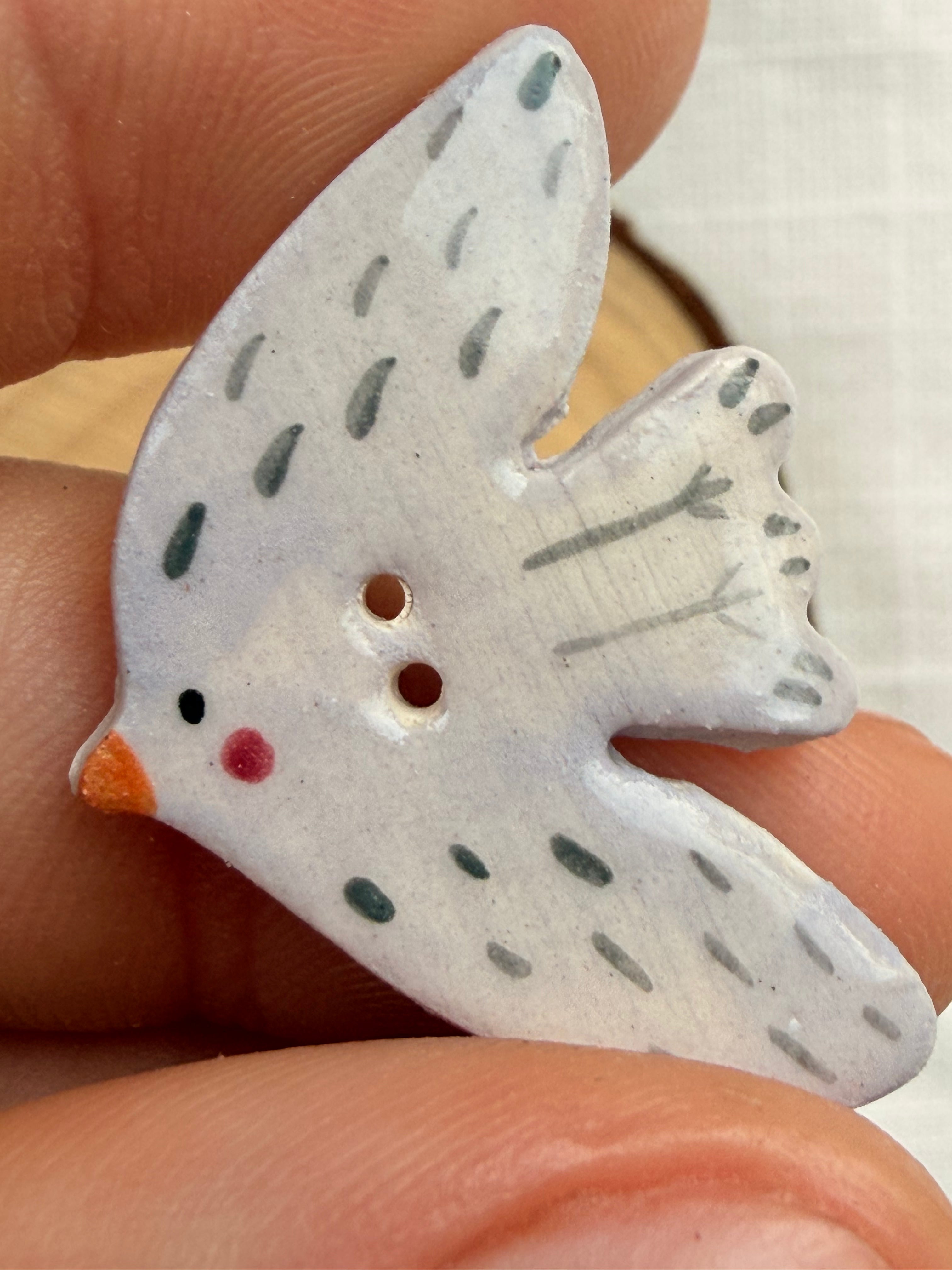 Handmade Ceramic Violet Bird Button – Hand-Painted Sewing Embellishment